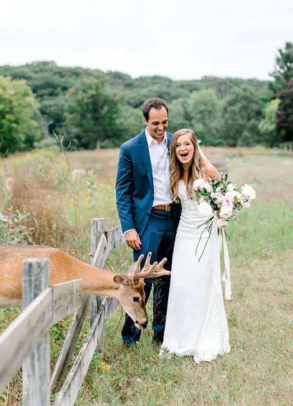 This Couple Gets A Surprise Wedding Crasher Who Eats The Bouquet Flowers